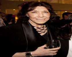 Lily Tomlin consuming alcohol